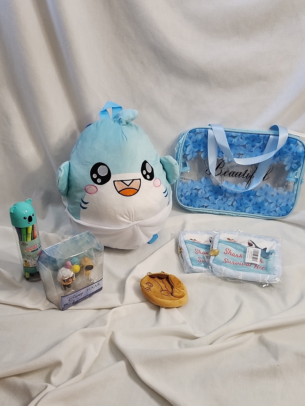 Blue Shark Plush Backpack, Pixar "UP" Figurines & Toilitries Set